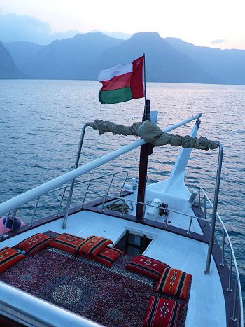 Flag of Oman and Musandam moutains