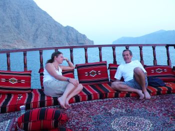 Relaxing on the live-aboard dhow's top deck after a day's survey work